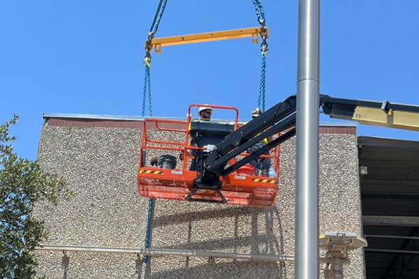 Worker On Lift - Bohden Contracting Group